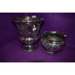 Two ornate vintage silver plated planters.