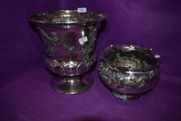 Two ornate vintage silver plated planters.
