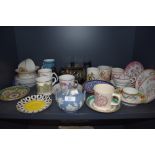 A selection of ceramics including a good selection of antique tea saucers including Royal