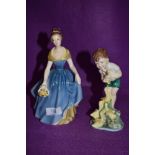 A royal Worcester Johnnie figure and a Royal Doulton Melanie figurine.