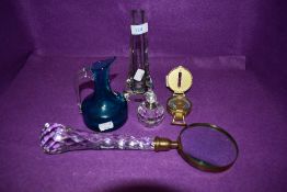 A selection of glass including long handled faceted magnifier,perfume bottle,jug and vase.