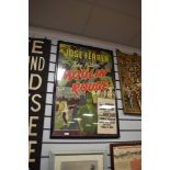 A framed vintage poster for John Hustons 1952 Moulin Rouge.