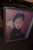 A framed textured abstract print of a young girl.