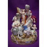 An impressive and substantial figure base depicting mythological and religious imagery of Cupid