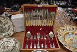 A partial canteen of vintage stainless steel and plated cutlery.