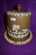 An impressive Jasperware stilton dome in the styled f Wedgwood with biscuit coloured ground and