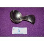 A Keswick school of industrial arts caddy spoon having hammered detailing, marked underside KSIA