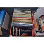 A box of vinyl LP reocrds of Musical and film interest and more.