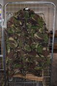 A camouflage coat having four pockets to front