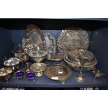 An assortment of plated wares and similar including vases, rose bowl, platters,cruet and more.