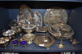 An assortment of plated wares and similar including vases, rose bowl, platters,cruet and more.