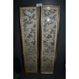 A pair of oriental hand sewn panels depicting moths and bambu