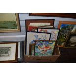 A box of needle works, prints and original art works.