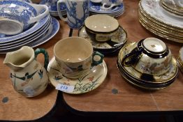 A collection of vintage Satsuma ware and similar oriental or oriental styled cup,saucer and jug