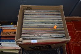 A mixture of vinyl LP records including easy listening and country.