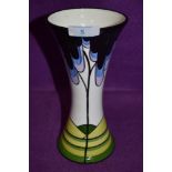 A modern ceramic vase in a Clarice Cliff style btamped Brian Wood L.Oakley Elmfield