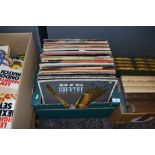 A box of vinyl LP records including Roxy music,Big country and more.