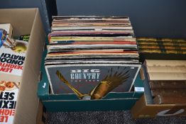 A box of vinyl LP records including Roxy music,Big country and more.