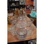 A variety of vintage glass decanters and selection of tazzas.