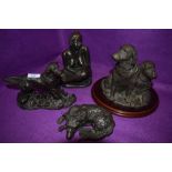 Four figurines,including limited edition Bette M curtis nude study, and three dogs including