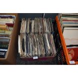 A collection of vinyl singles including rock and roll, easy listening and 80s.