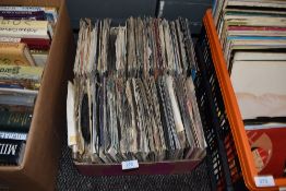 A collection of vinyl singles including rock and roll, easy listening and 80s.