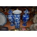 A blue and white wear Chinese export mantle garniture including pair of cherry blossom decorated