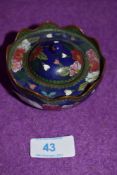 A cloissone enamel decorated korro decorated with peonies having three footed base AF with slight