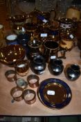 An assortment of vintage items including Prinknash bud vases, copper napkin rings,lustre detailed