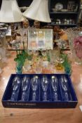 A mixed lot of vintage a retro glass including boxed lead crystal flutes and coloured glass.