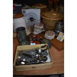 A mixed collection of kitchen ware including cutlery, herb sinner, veg spiraliser, napkin rings