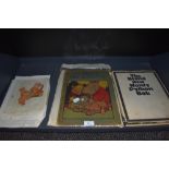 A vintage Monty python book, a vintage French childrens book and two vintage Lawson Wood prints.