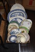 A large collection of vintage plates and platters, cups and saucers,lids and more.