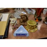 A collection of quirky collectable items including Dubonnet ash tray, Italian religious figurine,