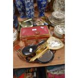 An art deco glass dressing table tray and candle sticks, a tin of costume jewellery, mirrors and