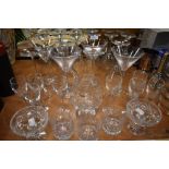 An assortment of glasses including Martini, tumbers ,wine glasses and more.