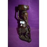 An African hand carved tribal wood figure or totem