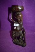 An African hand carved tribal wood figure or totem