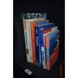 An assortment of Travel guides and gardening books.