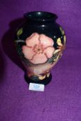 A Moorcroft vase of baluster form,Oberon designed by Rachel Bishop, having peach and navy ground