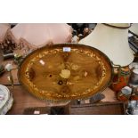 A vintage Italian inlaid gallery tray having brass handles and surround and floral design to