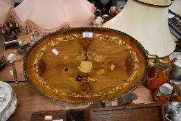 A vintage Italian inlaid gallery tray having brass handles and surround and floral design to