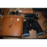 A collection of vintage binoculars including NKA,and telescopes.
