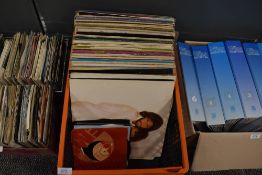 A collection of vinyl singles and LP records including orchestral, easy listening and more.