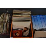 A collection of vinyl singles and LP records including orchestral, easy listening and more.