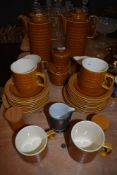 A collection of Hornsea pottery Saffron including salt and pepper pots,coffee pots,preserve jar