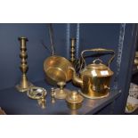 A selection of fire side items including brass spirit kettle candle sticks and sauce pan