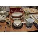 A selection of ceramics including Poole bowl Tremar style jug and train mug