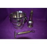 A vintage walker and Hall plated ice bucket, also included as a bottle opener/multi tool.