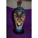 A Moorcroft Anna lily lamp base with shade, designed by Nicola Slaney,blue and cream ground with